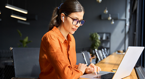 Woman listening to webinar