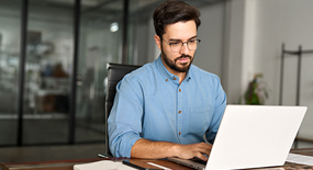Man using technology in the office.